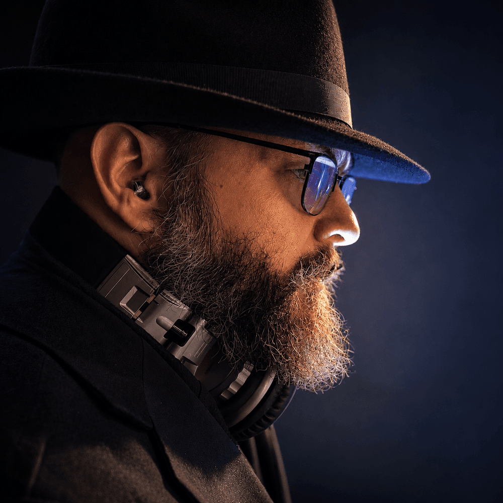 MixMaster Jack profile portrait in a fedora