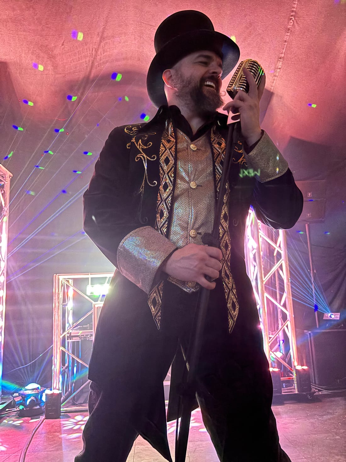 MixMaster Jack hosting karaoke with a vintage microphone